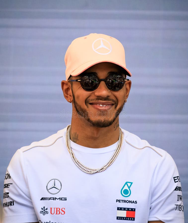 Monte Carlo, Monaco - May 25, 2018: British racing driver Lewis Hamilton, 5 time Formula One World Champion at the Monaco F1 Grand Prix race fan event age azur celebrity championship competition cote dazur driving europe european french grandprix luxury mercedes motor petronas principality riviera road south france speed sport sportscar track train transit transport transportation travel vehicle winner young. Monte Carlo, Monaco - May 25, 2018: British racing driver Lewis Hamilton, 5 time Formula One World Champion at the Monaco F1 Grand Prix race fan event age azur celebrity championship competition cote dazur driving europe european french grandprix luxury mercedes motor petronas principality riviera road south france speed sport sportscar track train transit transport transportation travel vehicle winner young