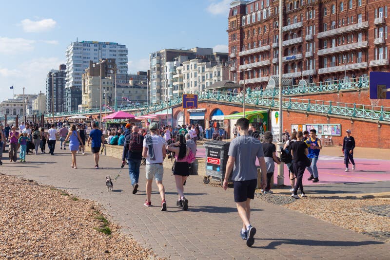 Britons escape on holidays to the Brighton beach in a nice sunny day.