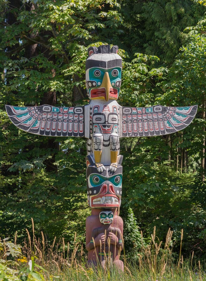 Broad Winged Totem Pole in Vancouver. Stock Photo - Image of wing, bird ...