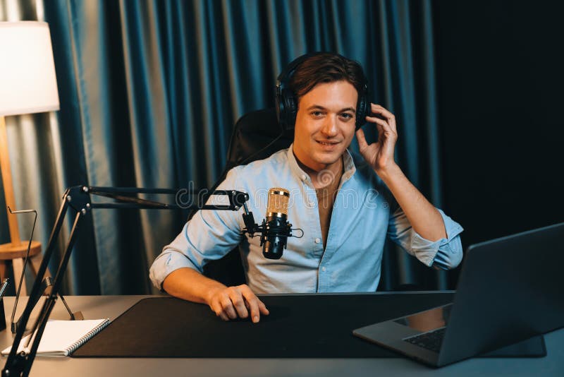 Broadcaster talking on live application searching on laptop. Pecuniary. stock images
