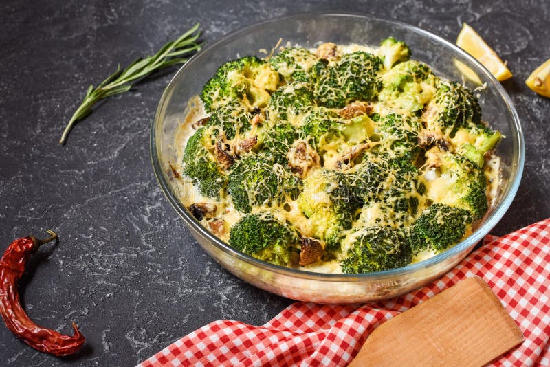 Broccoli Cheddar Egg Casserole in Baking Dish on Stone Background Stock