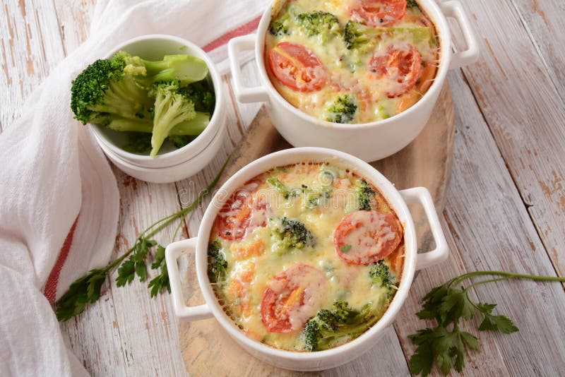 Broccoli Cheese and Egg Casserole in Baking Cocottes Stock Image