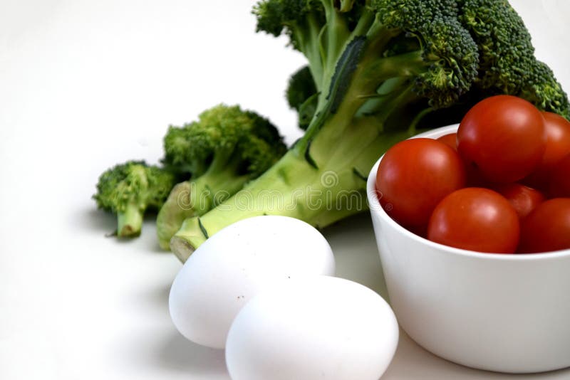 Broccoli, Eggs and Cherry Tomatoes Stock Photo Image of object