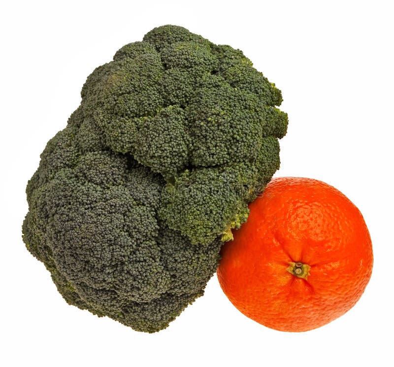 Broccoli flower and an orange.