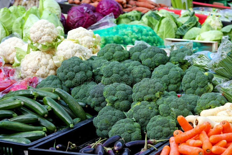 Green organic broccoli at farmer market stall. Green organic broccoli at farmer market stall