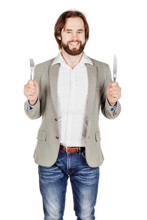 Broda mężczyzna mienia cutlery nóż na ręce i rozwidlenie zdjęcia stock Broda mężczyzna mienia cutlery nóż na ręce i rozwidlenie zdjęcia stock