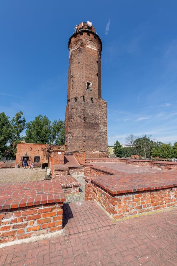 Brodnica, Kujawsko-pomorskie / Poland - August, 21, 2020: Red brick Teutonic tower. An old building from the Middle Ages.