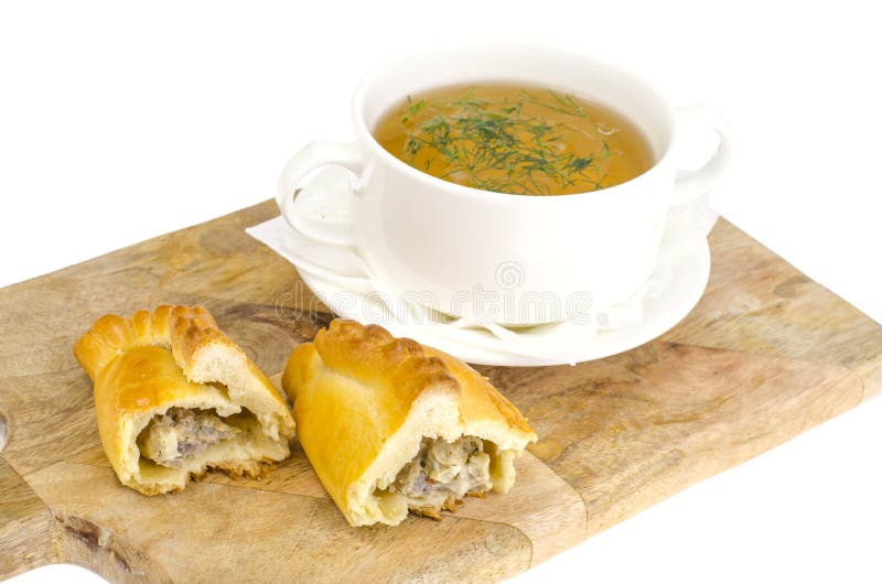 Brodo di carne con torta fotografia stock