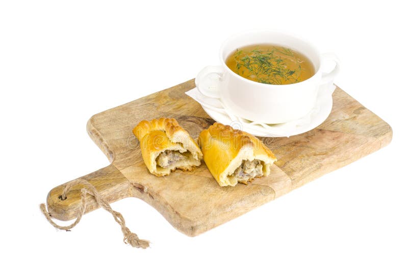 Brodo di carne con torta fotografia stock