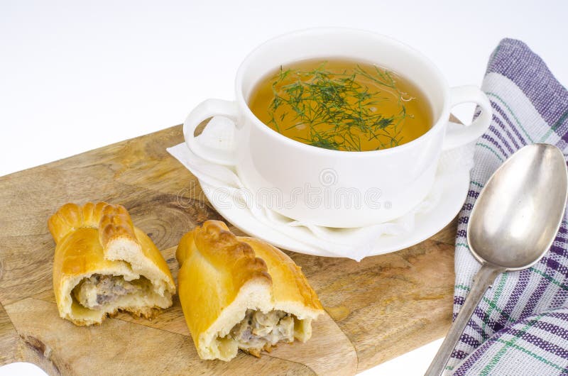 Brodo di carne con torta fotografie stock