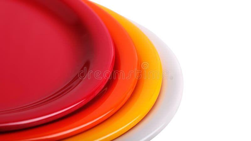 Red, orange, yellow and white plates stacked for display. Red, orange, yellow and white plates stacked for display.