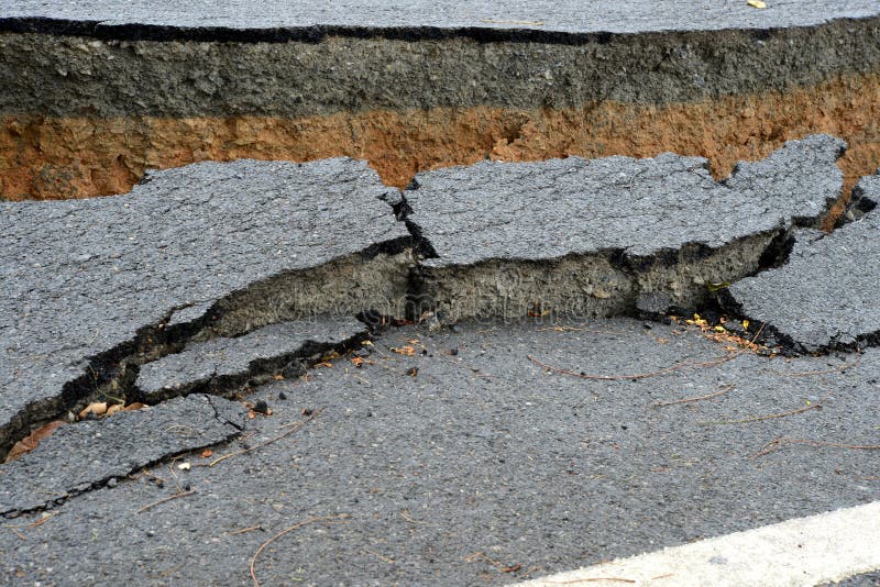 Layer of broken asphalt road at rural areas.