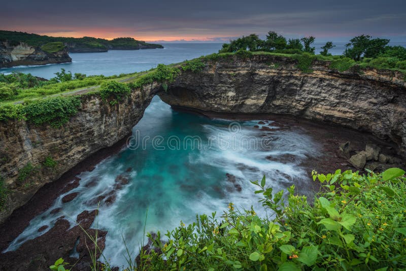 Broken beach on Nusa Penida island at sunrise stock image Broken beach on Nusa Penida island at sunrise stock image
