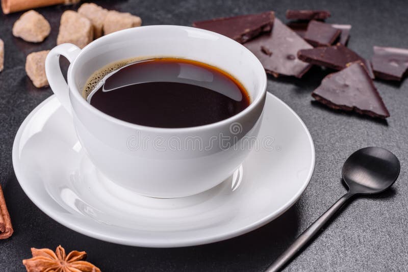 Broken Black Chocolate Pieces with Star Anise and Cinnamon Stock Image