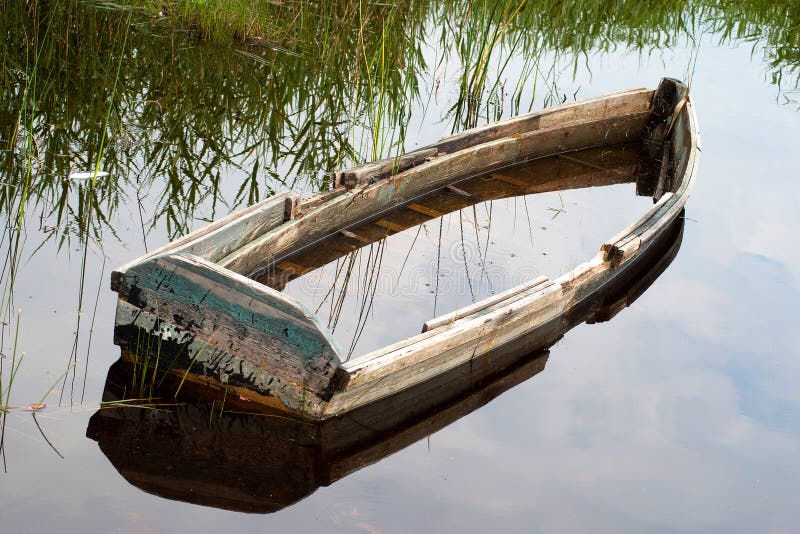 broken-boat-16995691.jpg