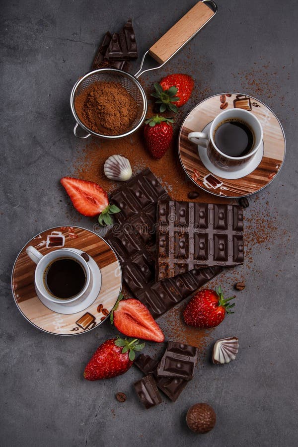 https://thumbs.dreamstime.com/b/broken-chocolate-blocks-strawberries-cups-coffee-o-broken-chocolate-blocks-strawberries-cups-coffee-299840128.jpg