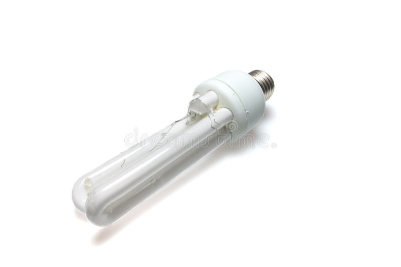 Broken Compact fluorescent lamp isolated