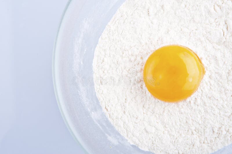Broken Egg on Flour, Means for Making Bread Stock Photo - Image of home