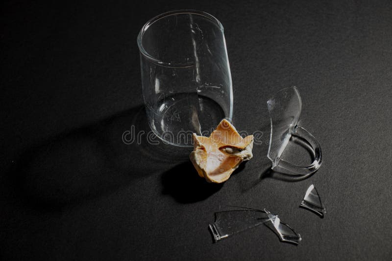 https://thumbs.dreamstime.com/b/broken-glass-cup-seashell-isolated-black-background-205942901.jpg