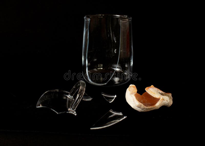 https://thumbs.dreamstime.com/b/broken-glass-cup-seashell-isolated-black-background-broken-glass-cup-seashell-isolated-black-background-205942987.jpg