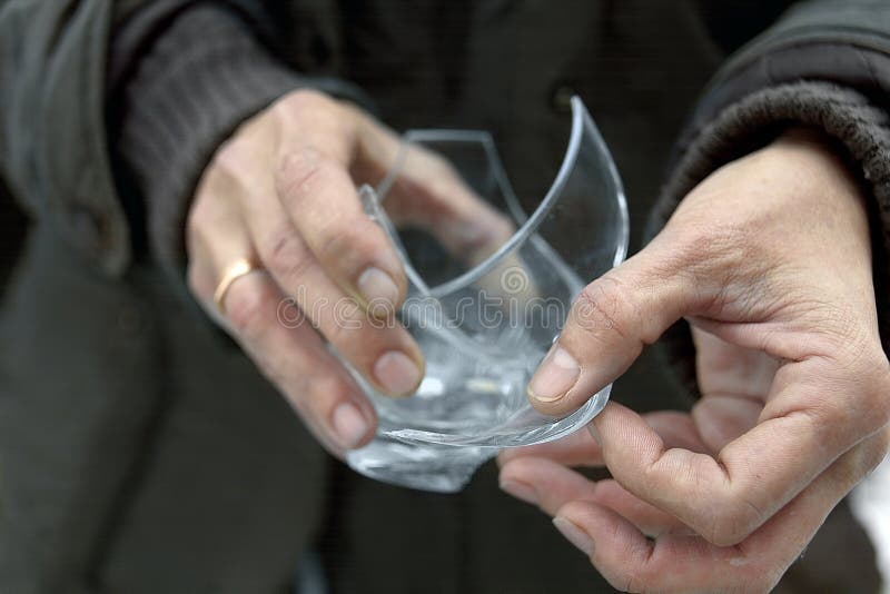 Broken Glass in Hands stock photo. Image of pieces, fingers 104454232