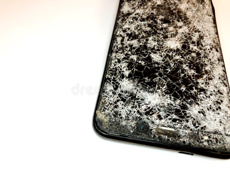 Broken Glass Mobile Phone on a White Background. Hammer Beating on the