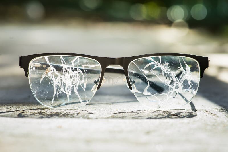 broken glasses on the asphalt