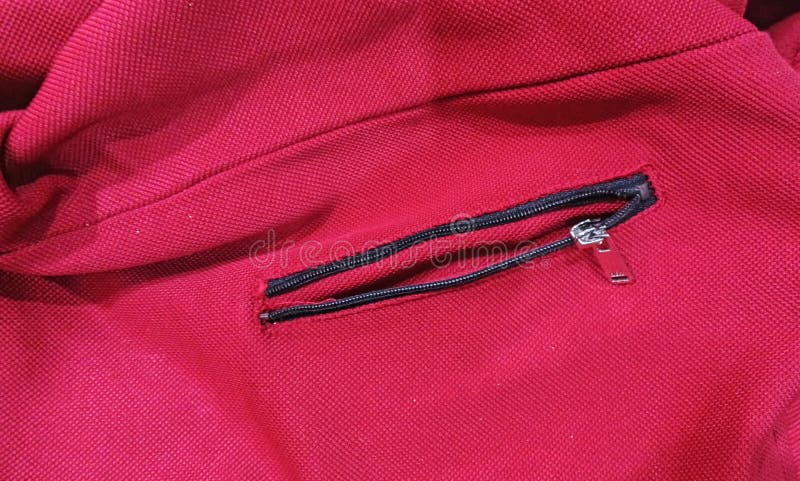 Broken or jammed zipper on a jacket pocket stock photos