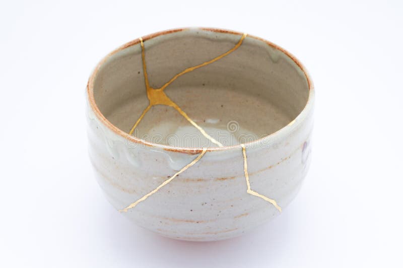 Antique Japanese ceramic kintsugi bowl restored with gold. Antique