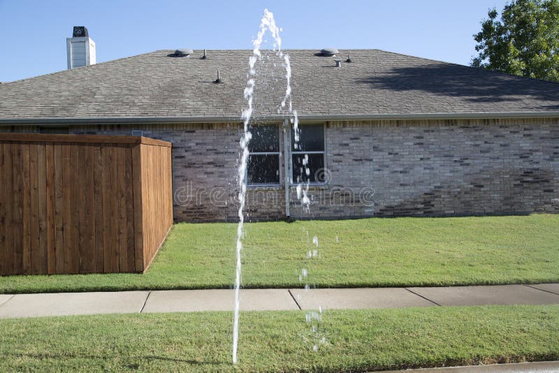 Broken lawn sprinkler royalty free stock photo