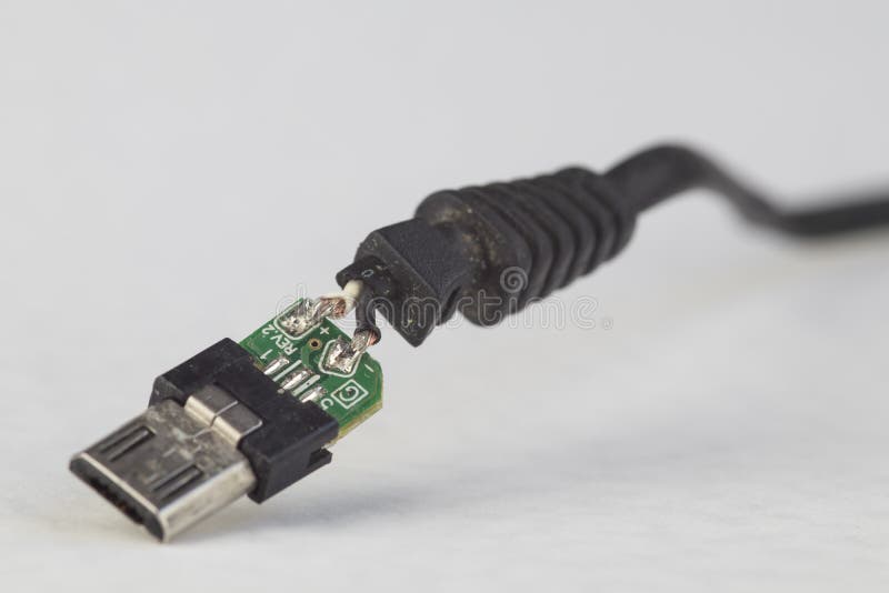 Broken USB Plug Jack Cable Showing Circuit Board. Communication