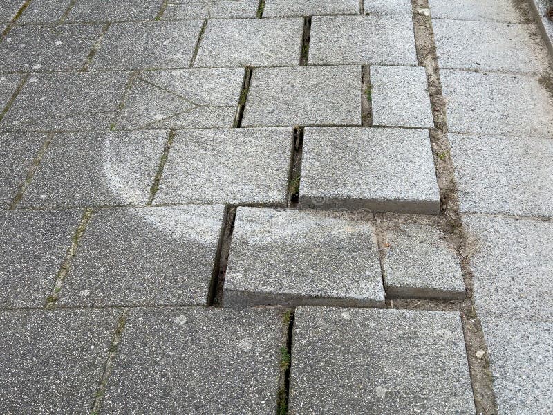 Broken Paving Slabs on Sidewalk Stock Image - Image of wall, damaged ...