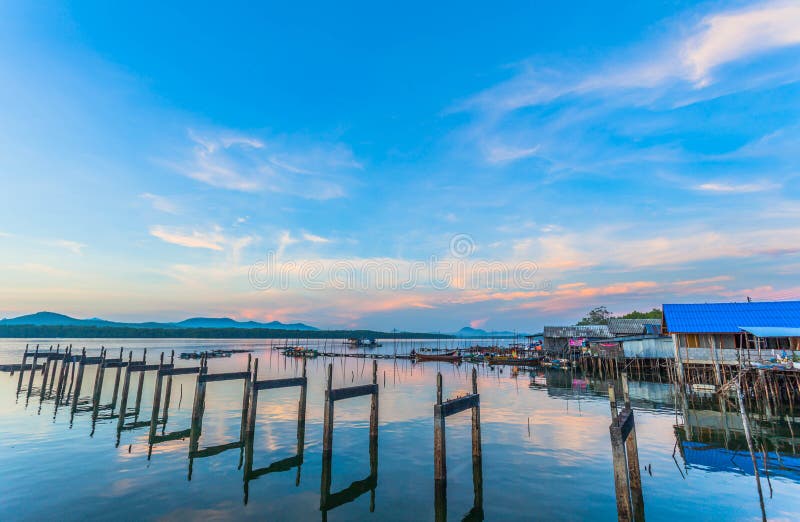 the broken pier at Bansamchong fishing village in Phang Nga province.