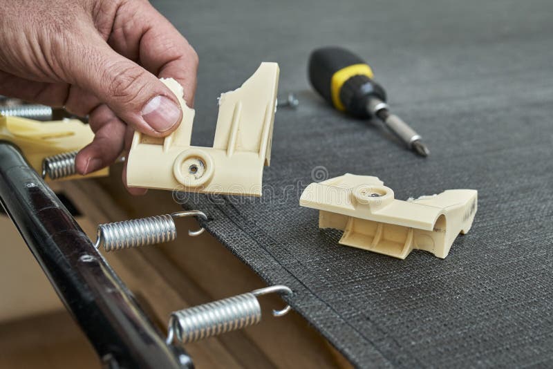 Broken Plastic Bed Slat Holder in Mechanic`s Hand Stock Photo Image of spring, tubular 107795426