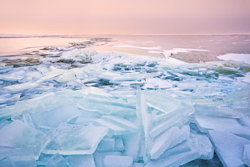 Broken shelf ice pieces at sunset on North sea