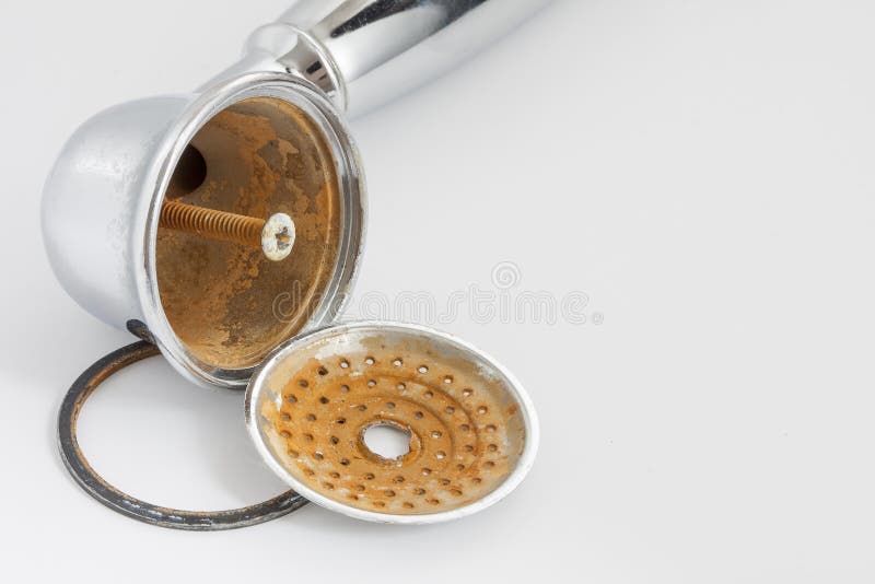 Broken shower head with limescale and rust on it. royalty free stock images