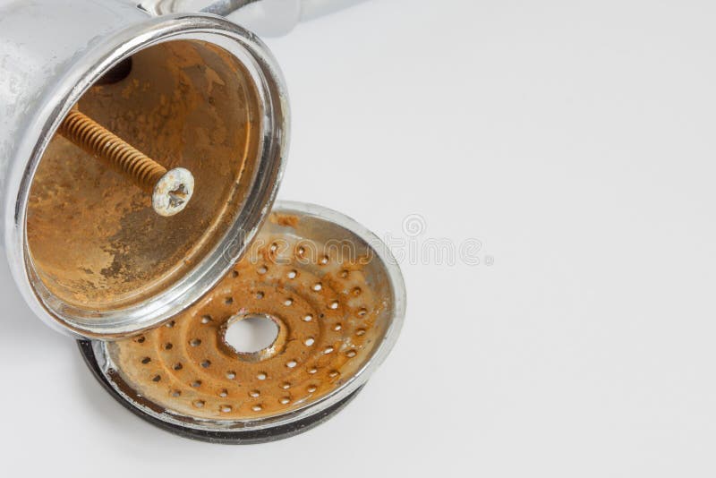 Broken shower head with limescale and rust on it royalty free stock photography