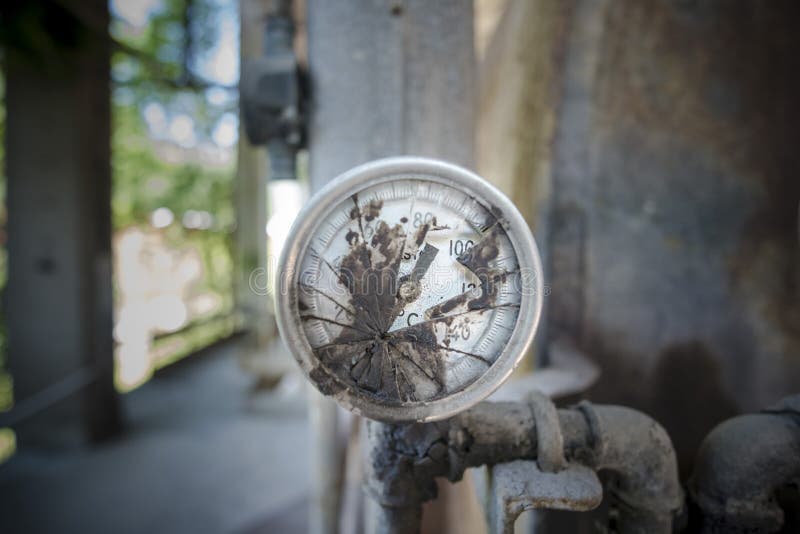 A Meter Box Broken into Outside with Cracked Dent Hole Old Danger Electric Gas Box on Brick Wall