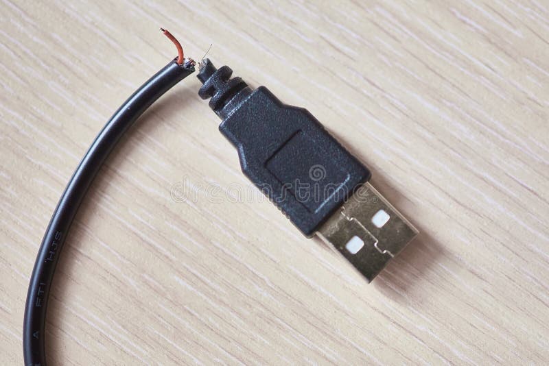 Broken Usb Cable on a Wooden Table Stock Photo Image of defective