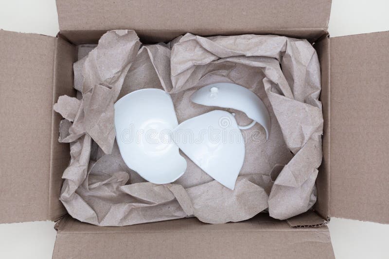 Broken White Cup in a Box with Packing Paper for Shipping. Close-up.  Concept of Careless Transportation of Things. Stock Image - Image of  damage, crush: 247107889