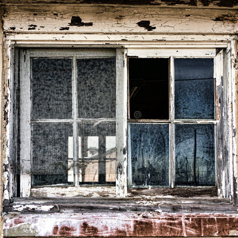 Broken Window on Old Derelict Abandoned Building