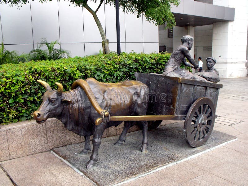 Bronze Sculpture of an Ox Pulling a Cart in a Square in Singapore