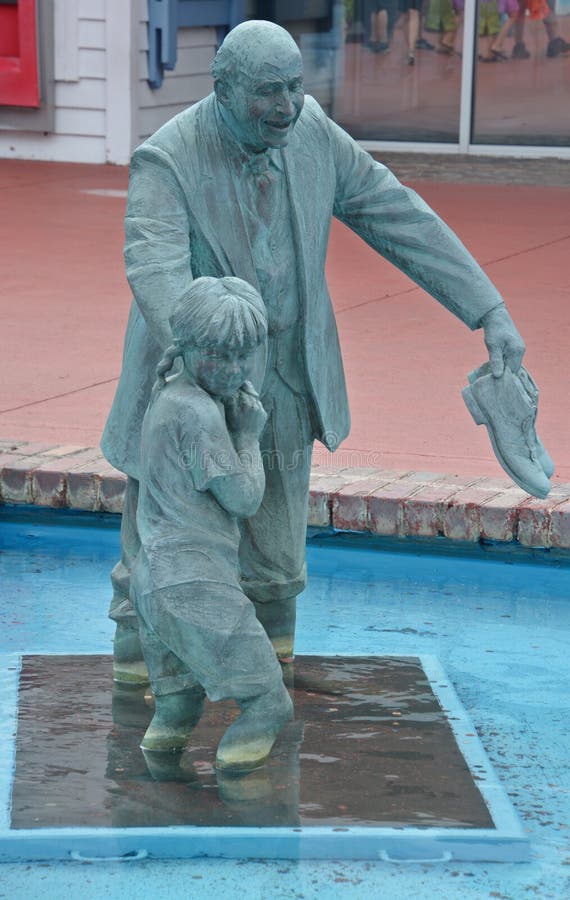 MYRTLE BEACH SOUTH CAROLINA JUNE 29 2016: Bronze statues dedicated to the families of the world sponsored by Burroughs & Chapin Company Inc