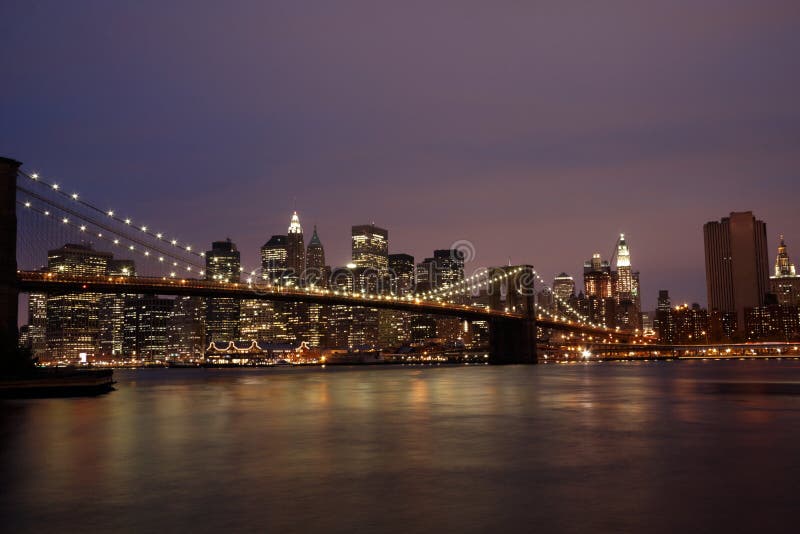 Brooklyn bridge at night stock photo