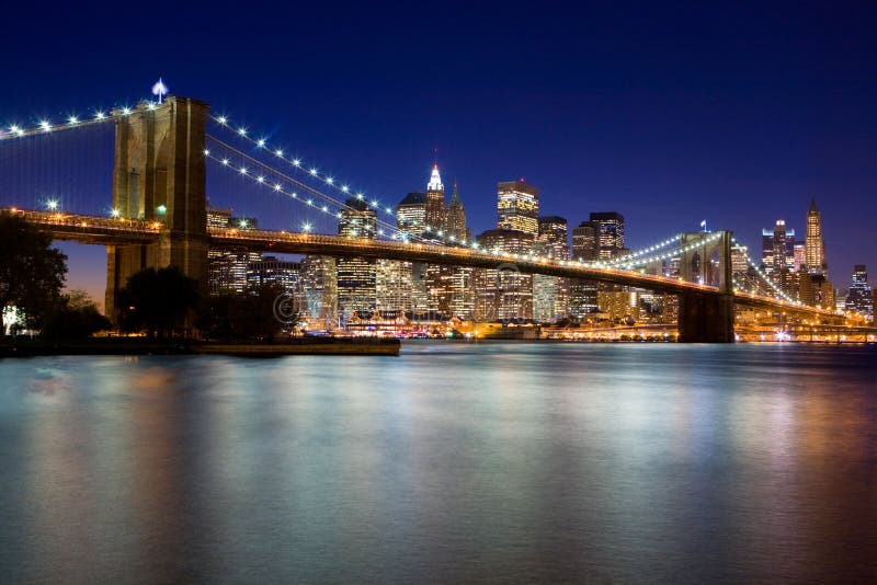 Brooklyn Bridge at Night stock photo. Image of urban, buildings - 7657834
