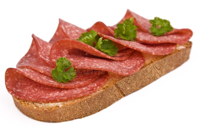 Brot mit Salami stockfoto. Bild von gewicht, grün, getrennt - 12732318