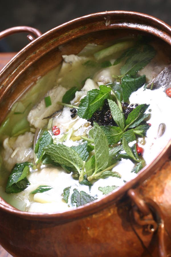 Broth in bowl of Chinese jar