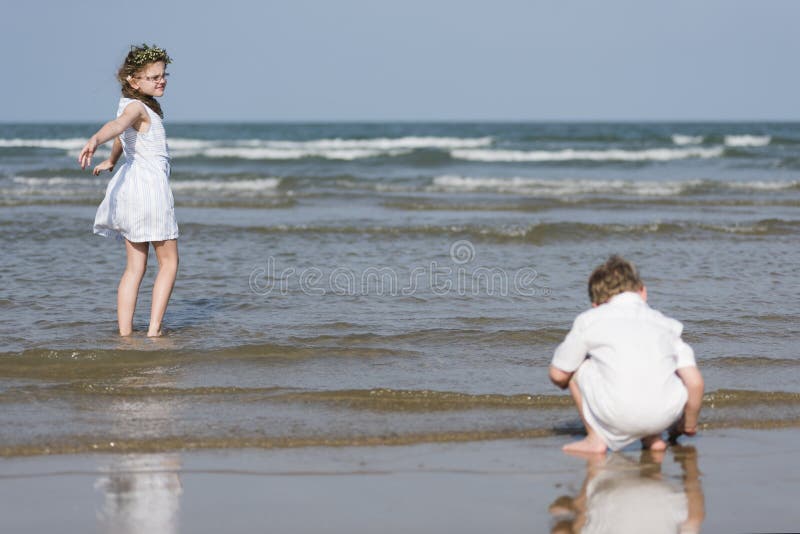 Brother and Sister Enjoying a Beach Stock Photo Image of brother
