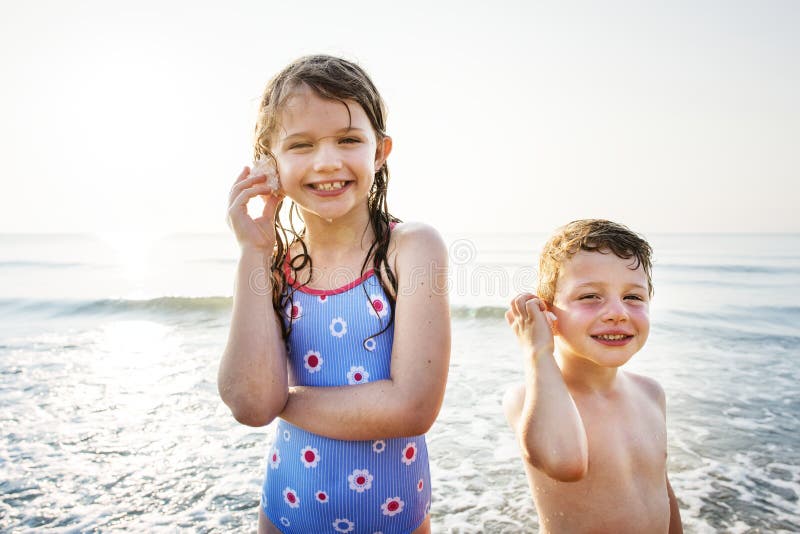 Brother and Sister Enjoying the Beach Stock Image Image of cute