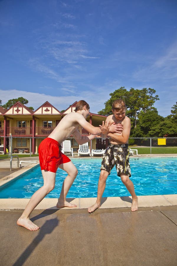 Brothers having fun at the pool